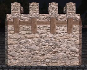 Tall rounded stone wall