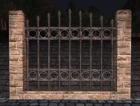 A Sandstone high iron fence